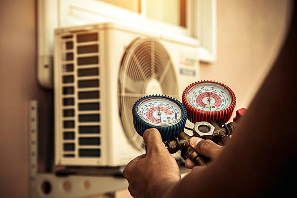 Professional Hvac technician working in Ballston Lake, NY